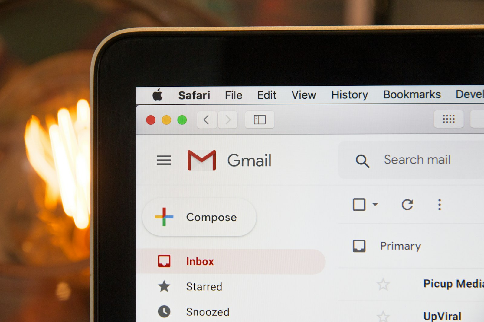 Gmail inbox interface on a laptop screen